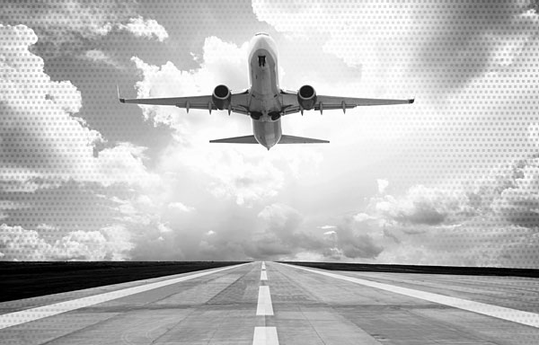 Image of an aircraft in flight, taking off from the runway. SafeTech specialize in aircraft safety and survival equipment MRO services and AOG support to reduce costs and maximize airtime.