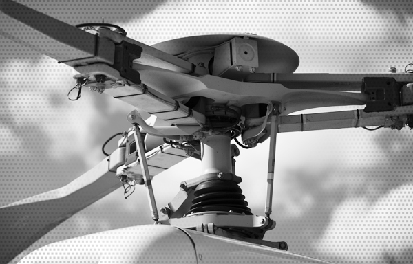 Image of the rotor hub on a helicopter. SafeTech USA provide safety and survival equipment MRO services for all types of aircraft across the USA including airplanes and helicopters.